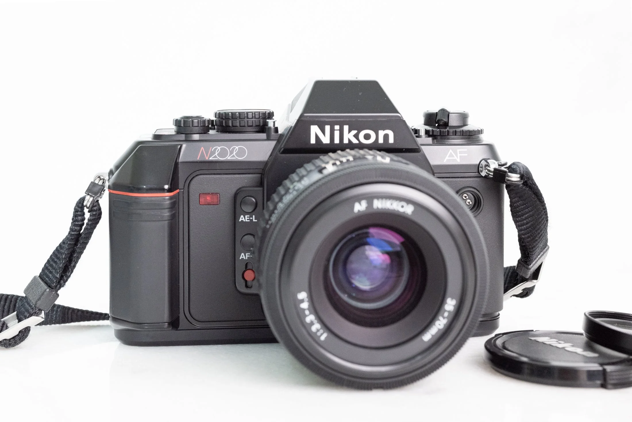 Nikon F4 MB-21 TOKINA AT-X28-70